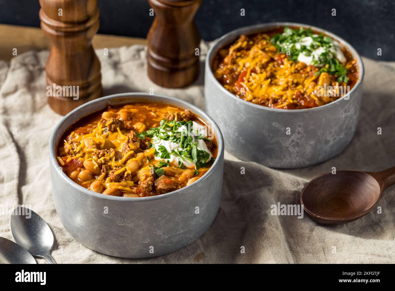 Homemade Turkey Chili Con Carne with Sour Cream and Cheese Stock Photo