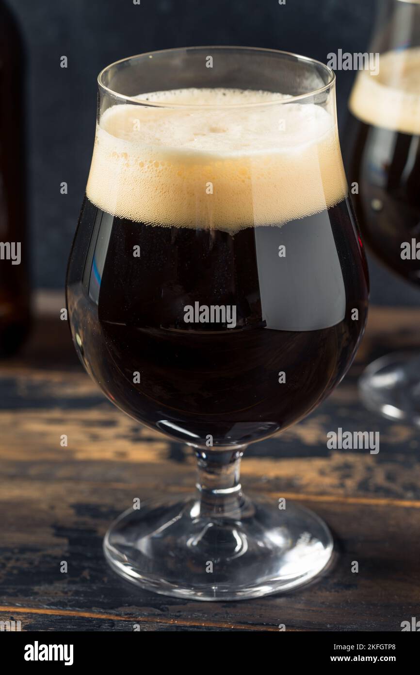 Boozy Cold Craft Porter Stout Beer in a Footed Glass Stock Photo Alamy
