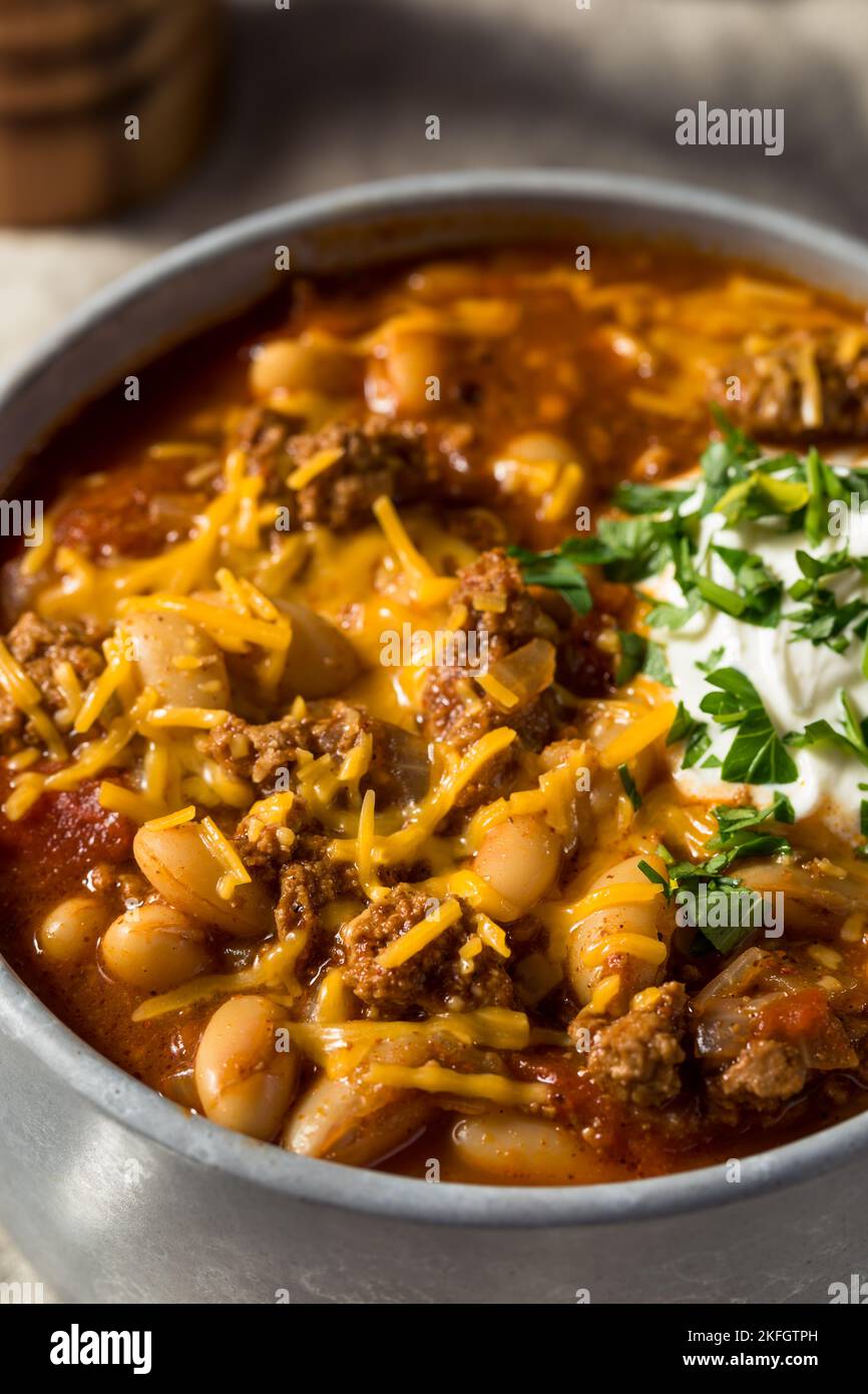 Homemade Turkey Chili Con Carne with Sour Cream and Cheese Stock Photo