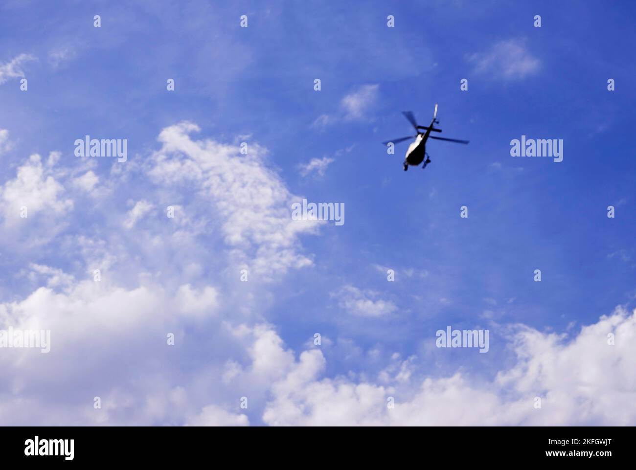 Helicopter flying in moody cloudy hi-res stock photography and images ...