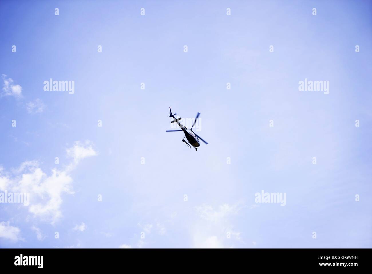 Helicopter flying in moody cloudy hi-res stock photography and images ...