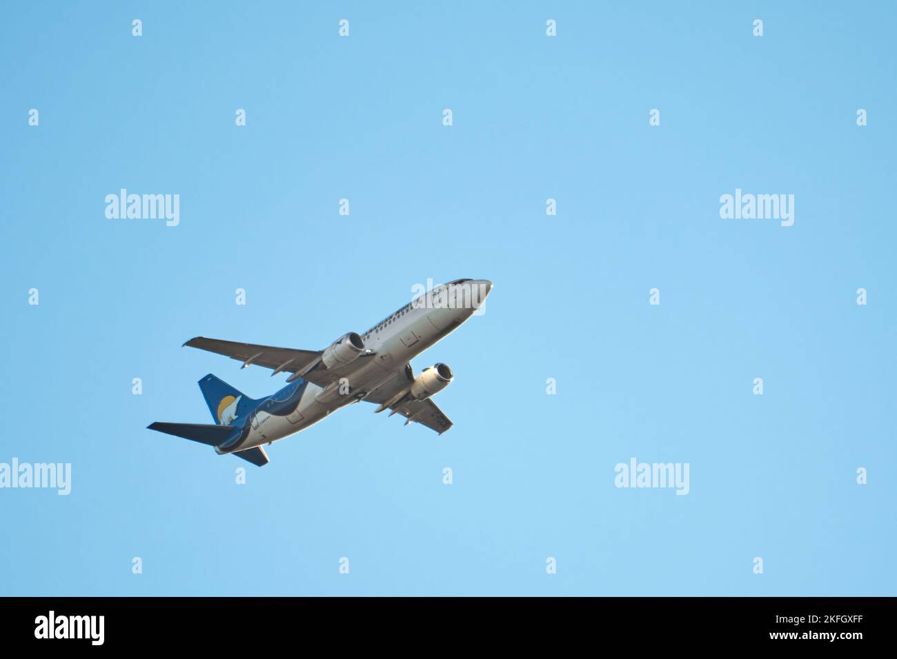 Ottawa, Ontario, Canada - November 7, 2022: A Boeing 737, operated by the Inuit-owned airline Canadian North, ascends over Ottawa after takeoff. Stock Photo