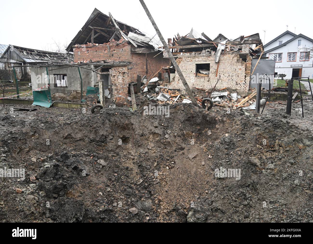 Lviv region, Ukraine - November 16, 2022: A crater after a Russian missile strike in a village, near the western Ukrainian city of Lviv. Stock Photo
