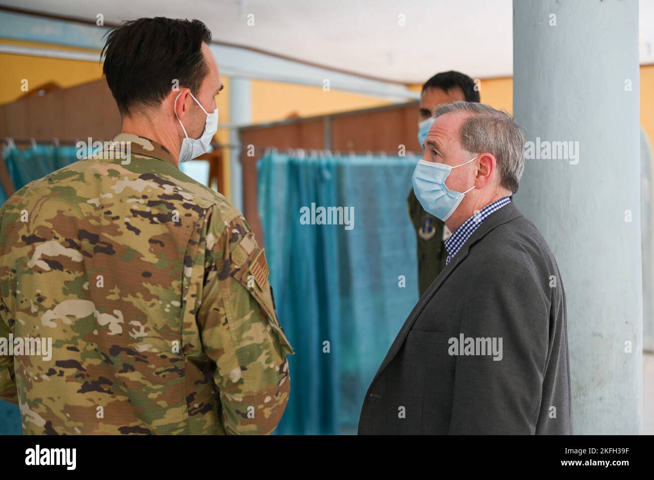 U.S. Air Force Lt. Col. Adam Howes, chief of the medical staff, speaks ...