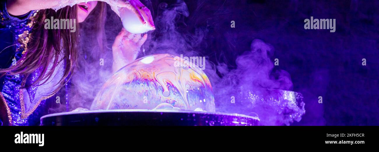 Bubble show for birthday party. Professional presentation with blowing
