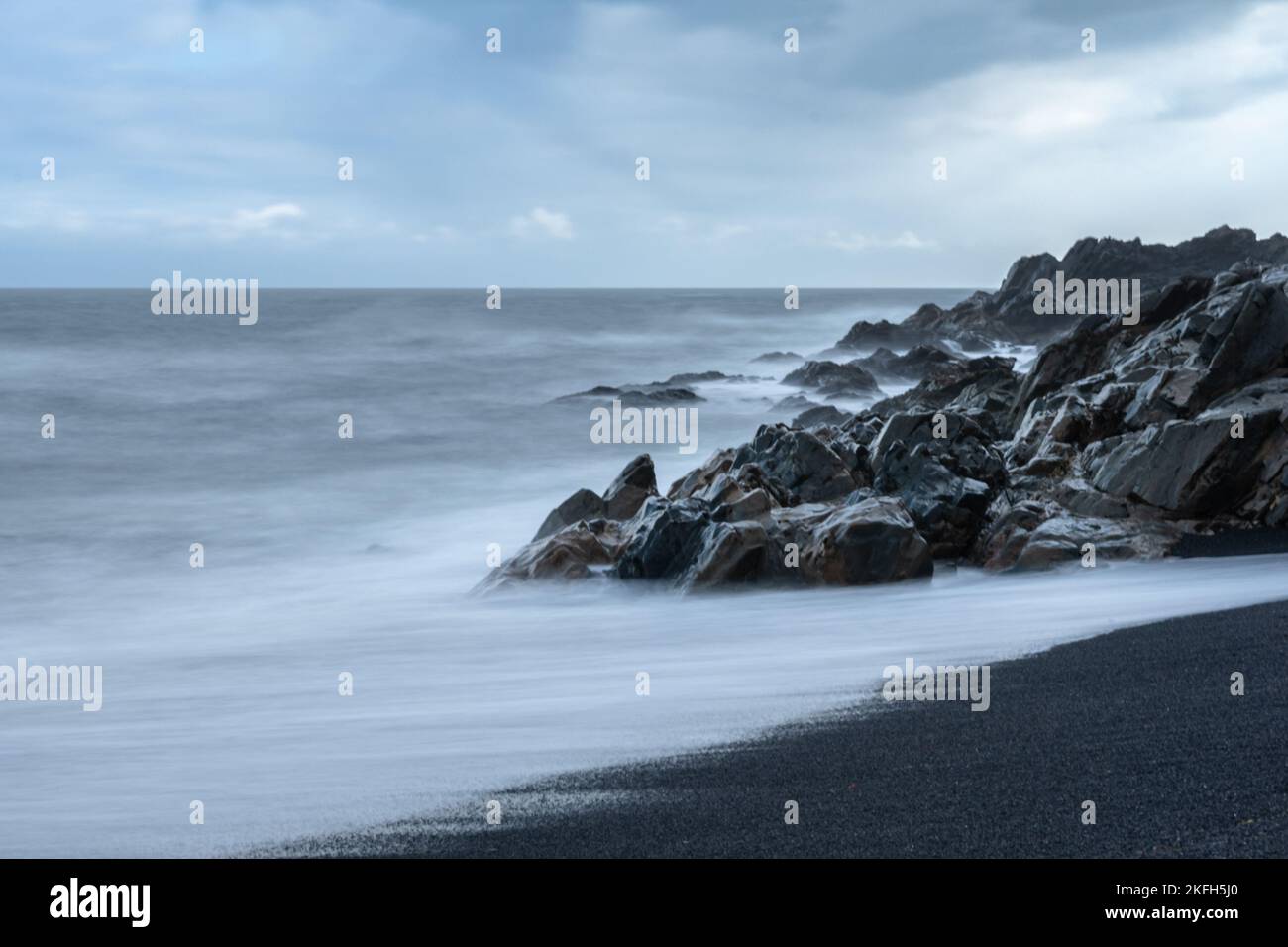 Waves hitting beach sunset shot hi-res stock photography and images - Alamy