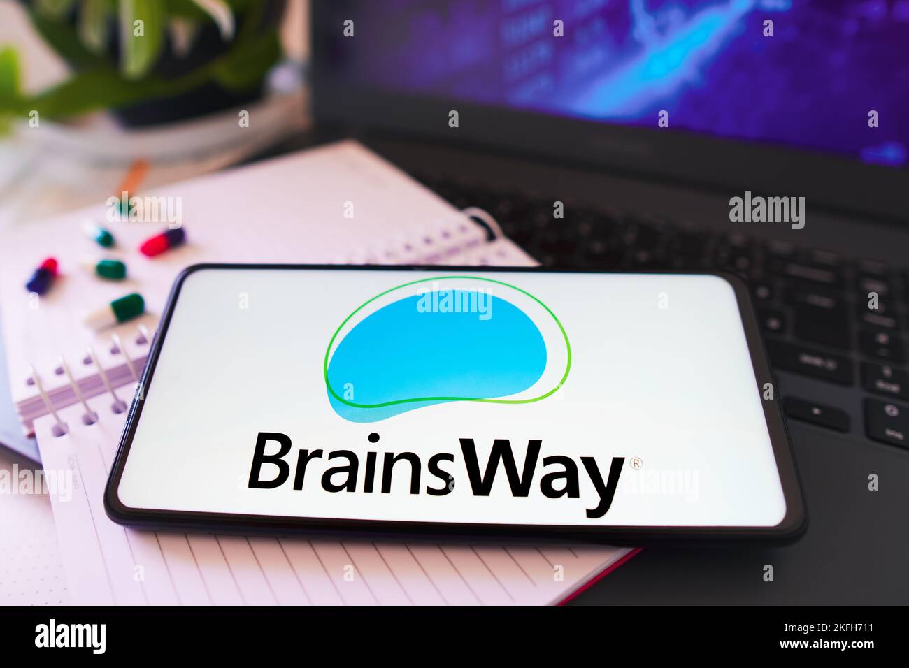 In this photo illustration, the BrainsWay logo is displayed on a ...