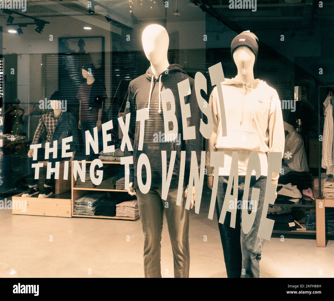 'The next best thing to vintage'. Levi store window display Stock Photo