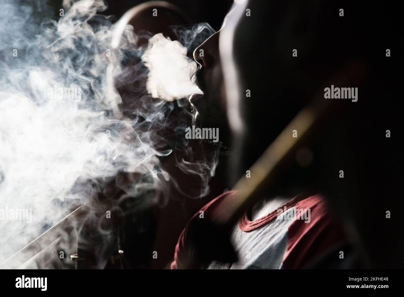 Doha, Qatar March 05, 2022 Local people smoke shisha in the old