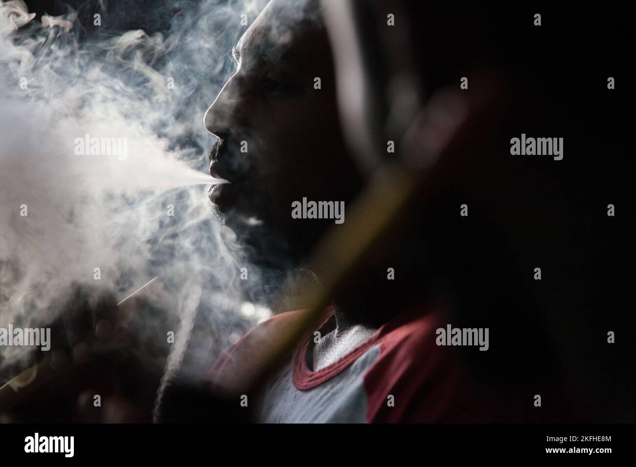 Doha, Qatar March 05, 2022 Local people smoke shisha in the old