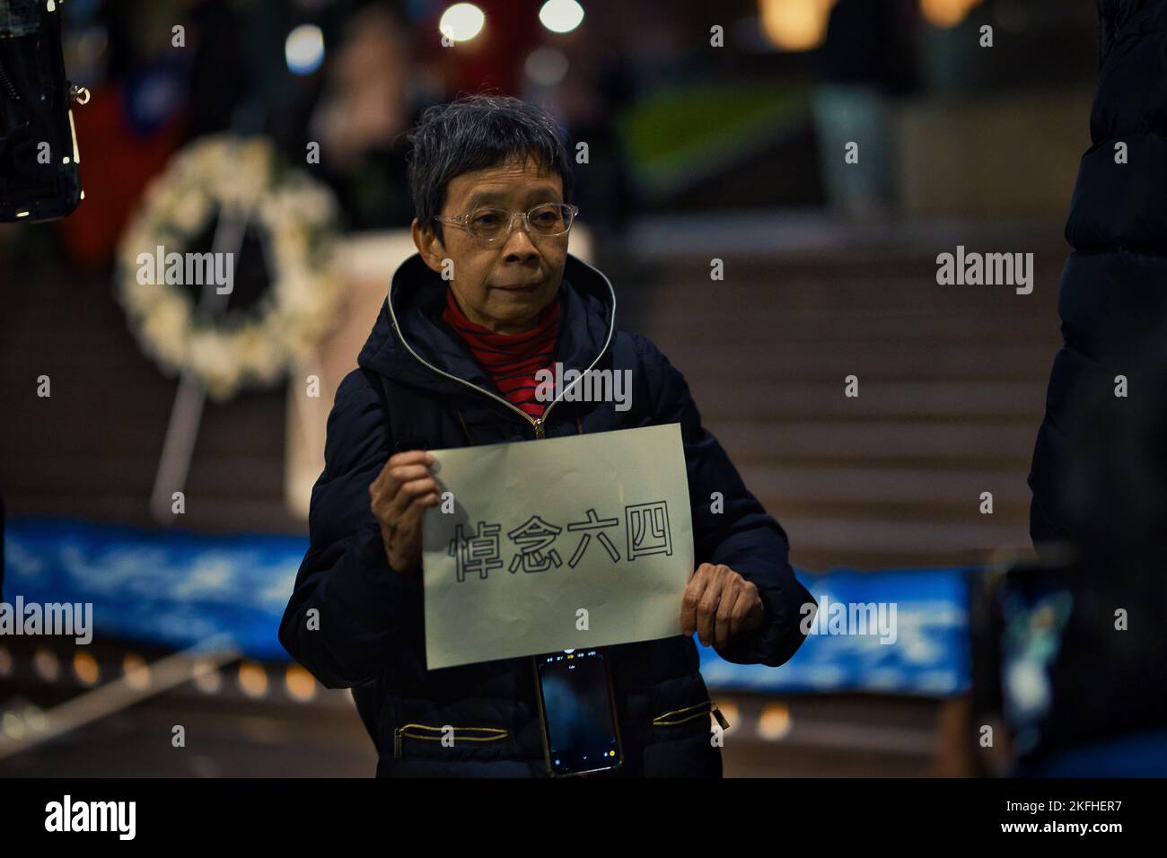 A woman protesting in the Tiananmen Square massacre vigil at the State library of Victoria Stock Photo