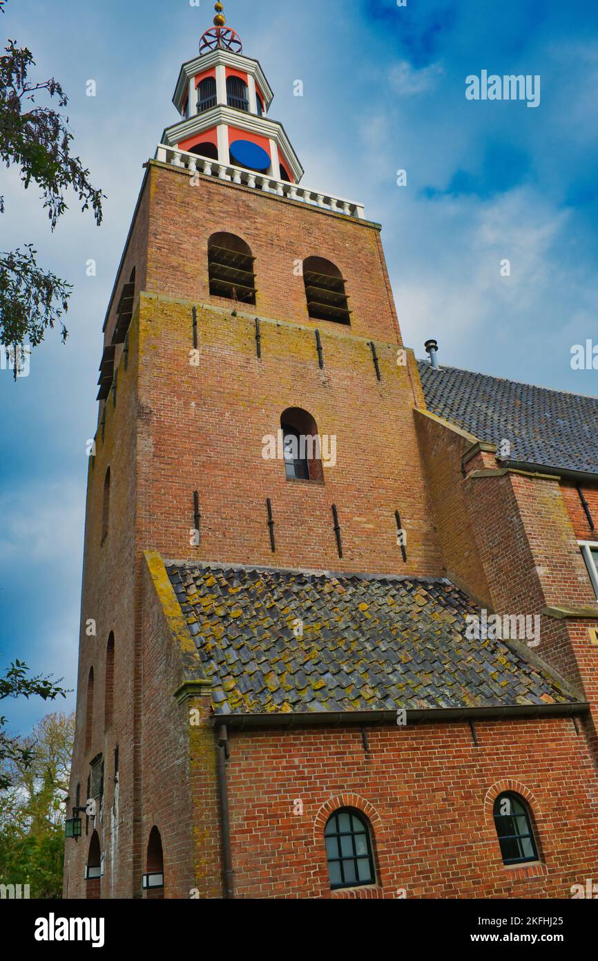 The early 19th-century tower of the Petrus Church (Petruskerk) in the village of Pieterburen, province of Groningen, the Netherlands Stock Photo