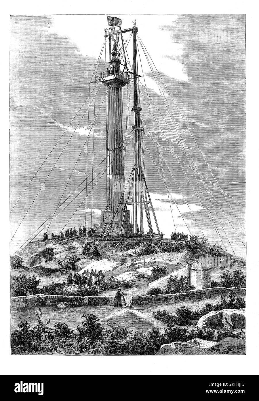 A mid-19th century drawing of the erection of the Marquess of Anglesey's Column, aka Anglesey Column or Tŵr Marcwis in Welsh. The  27-metre-high (89 ft) Doric column near the Menai Strait in Wales, is dedicated to Henry William Paget (the first Marquess of Anglesey) to commemorate his valour in the Napoleonic Wars and was designed by Thomas Harrison to stand close to Paget's country retreat at Plas Newydd. It was completed in 1860 (after the Marquess had died) when the brass sculpture at the top was added. Stock Photo