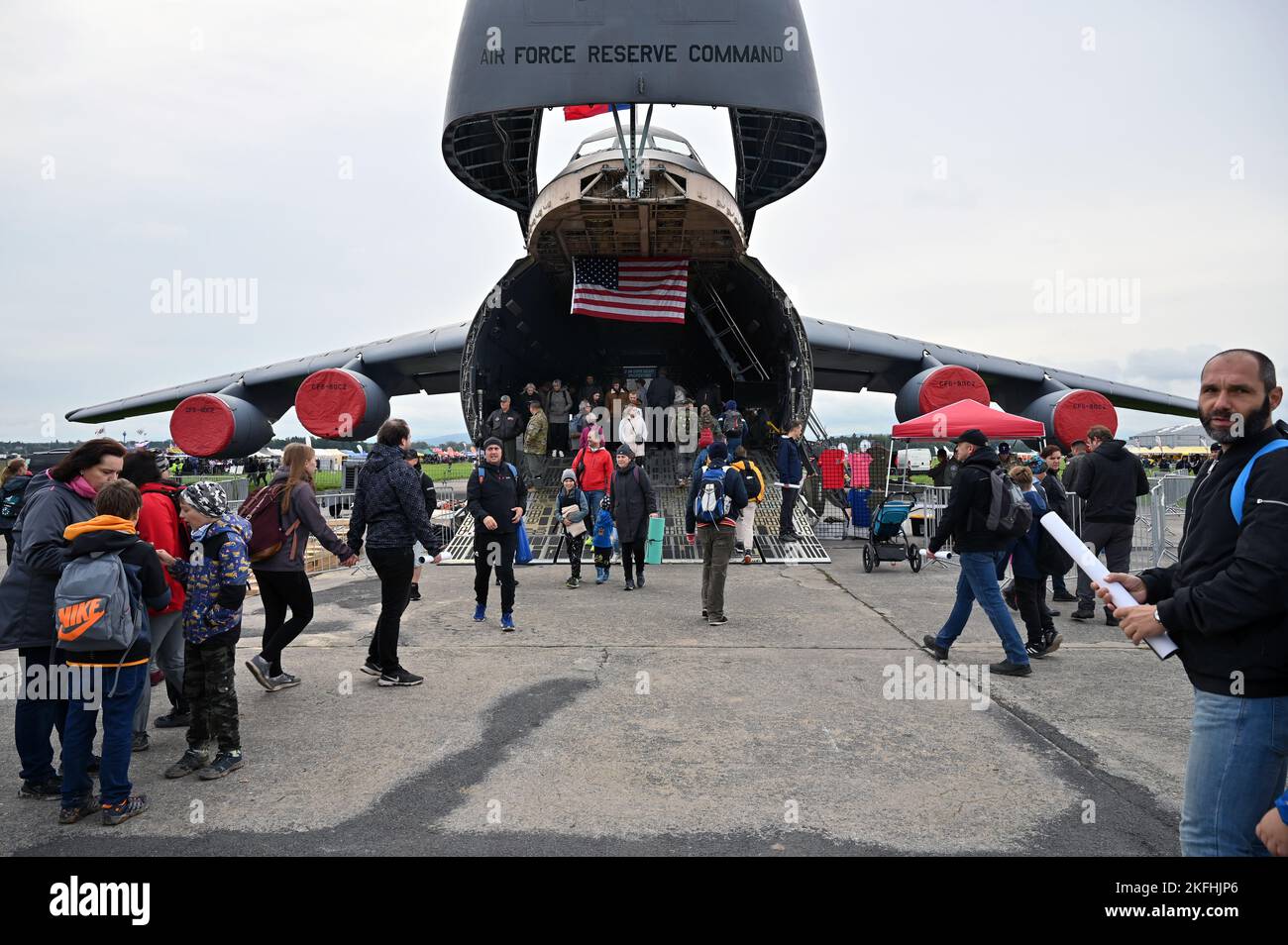 Guests walk through a C-5M Super Galaxy aircraft during the NATO Days air show in Ostrava, Czech Republic, Sept. 17, 2022. More than 110,000 people attended the event over two days. Stock Photo