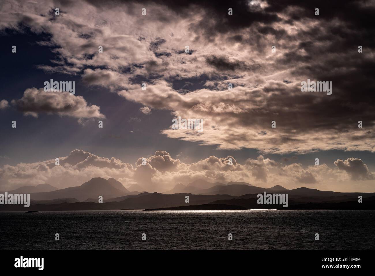 The mountains of the Isle of Skye in silhouette, Scotland Stock Photo