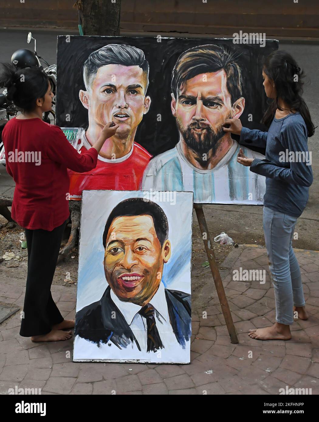Students from Gurukul school of art paint posters of soccer players Cristiano Ronaldo, Lionel Messi ahead of the FIFA World cup 2022 to be held in Qatar. FIFA World cup will be held from 20th November till18th December 2022 in Qatar. Stock Photo