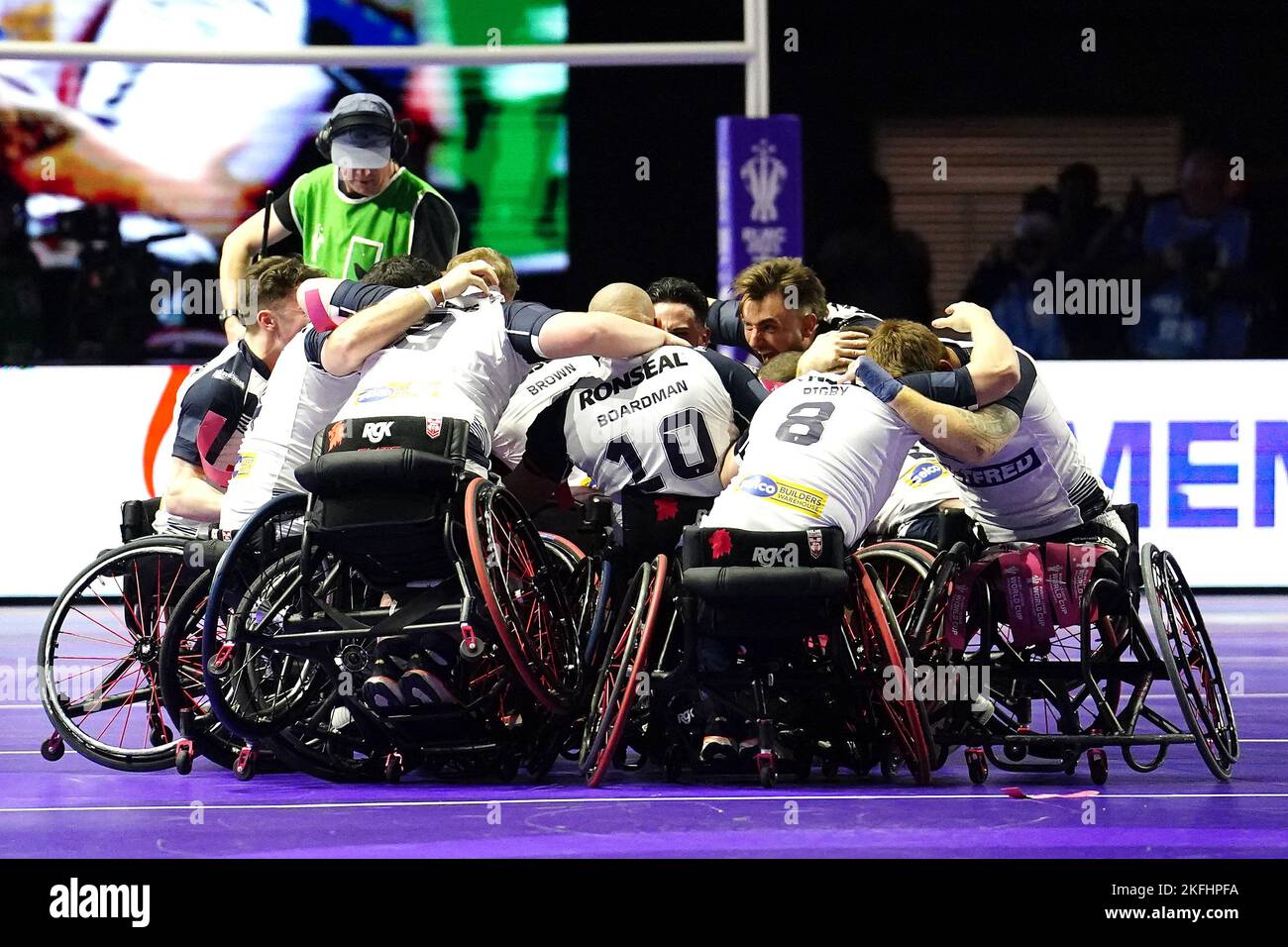 England players celebrate victory in the Wheelchair Rugby League World