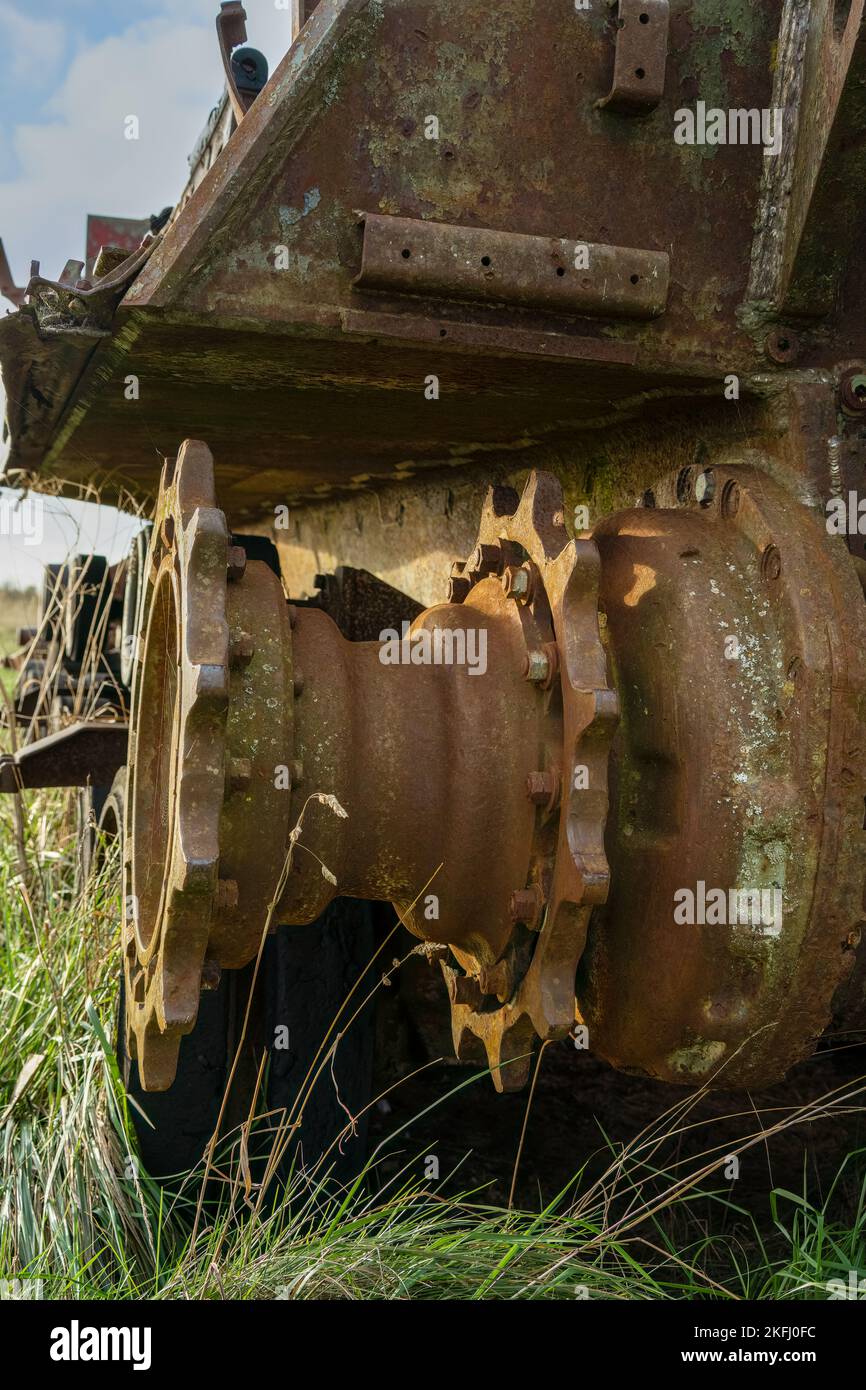 an abandoned rusting British FV4201 Chieftain main battle tank wreck in afternoon sunlight Stock Photo