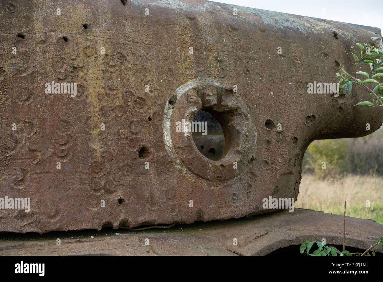 rust covered carcass of an abandoned wrecked rusting British Centurion main battle tank in afternoon sunlight Stock Photo