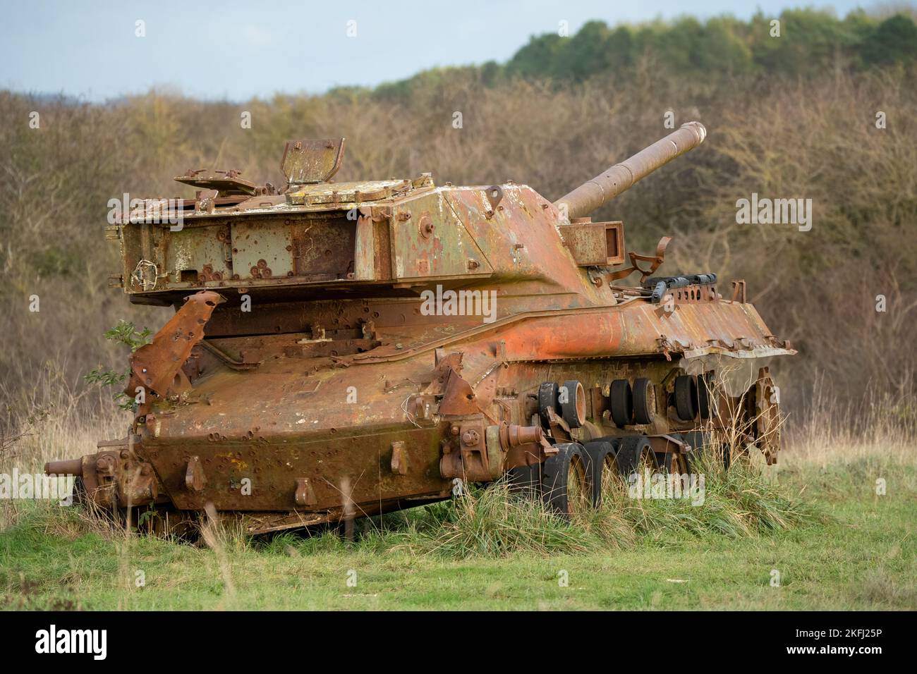an abandoned rusting British FV4201 Chieftain main battle tank wreck in