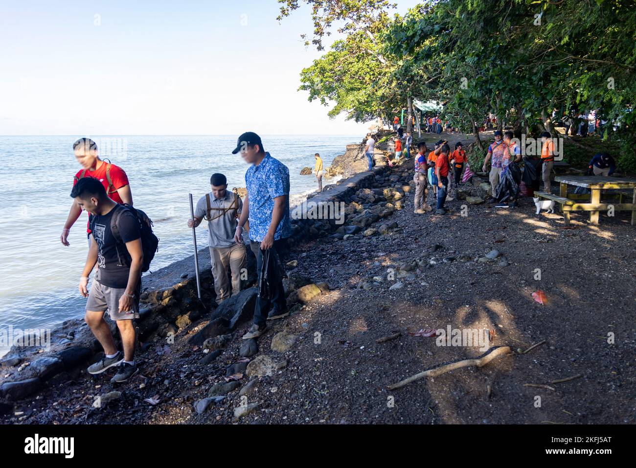 Members of the Philippine Coast Guard (PCG) and U.S. Special Operations Task Force (SOTF) 511.2 participate in a coastal cleanup during International Coastal Cleanup Day in Zamboanga, Philippines, Sept. 17, 2022. SOTF 511.2 regularly conducts humanitarian and civic assistance activities to provide direct support to the local community while also forging greater relationships with partners from the PCG, Armed Forces of the Philippines, and various local organizations. Stock Photo