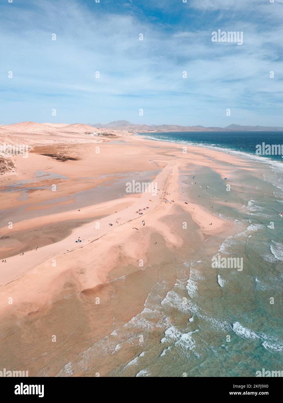 aerial drone shot from Canary islands. Sotavento beach in Fuerteventura, kite surfers Stock Photo