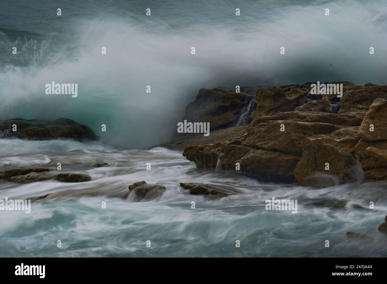 sea water hitting the rocks on the coast of Galicia, Arteixo Stock ...