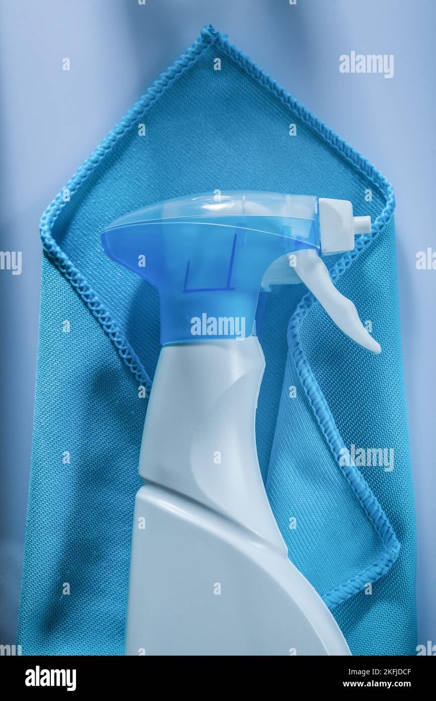 Blue washing rag sprayer on white background Stock Photo - Alamy