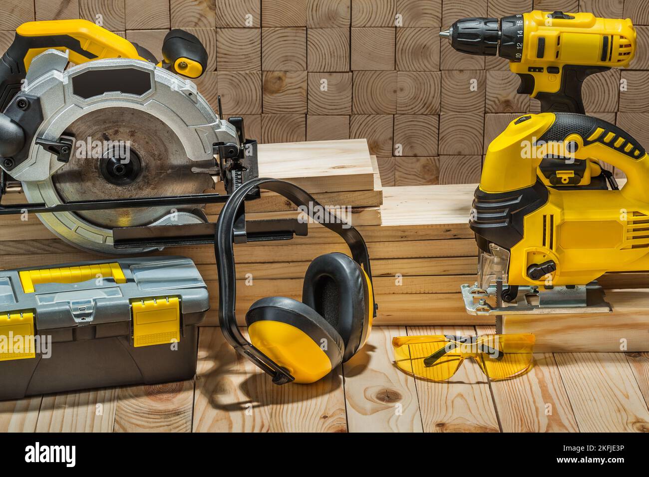 construction carpentry electric hand tools on wooden background Stock Photo