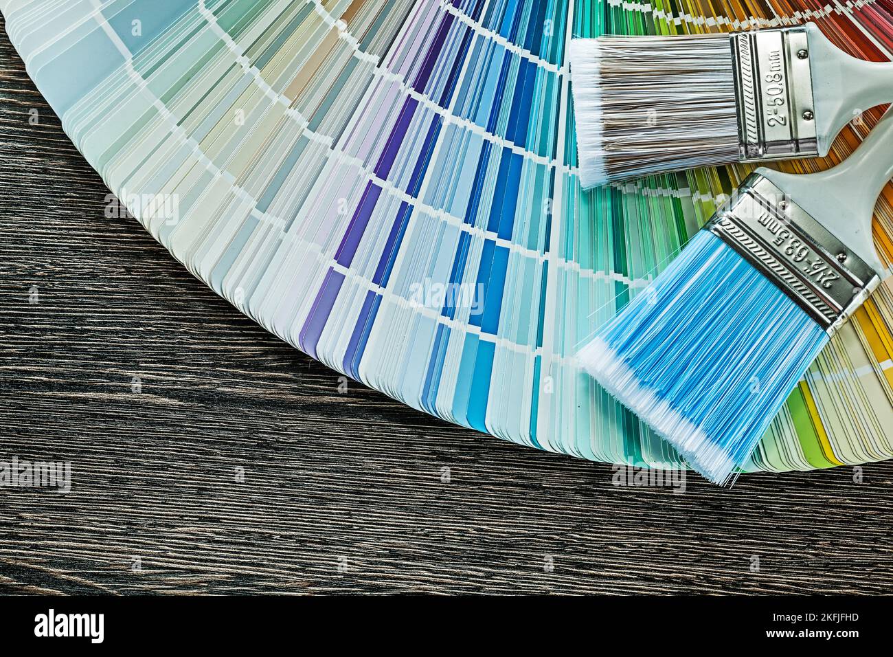 Paintbrushes pantone fan on wood board Stock Photo Alamy