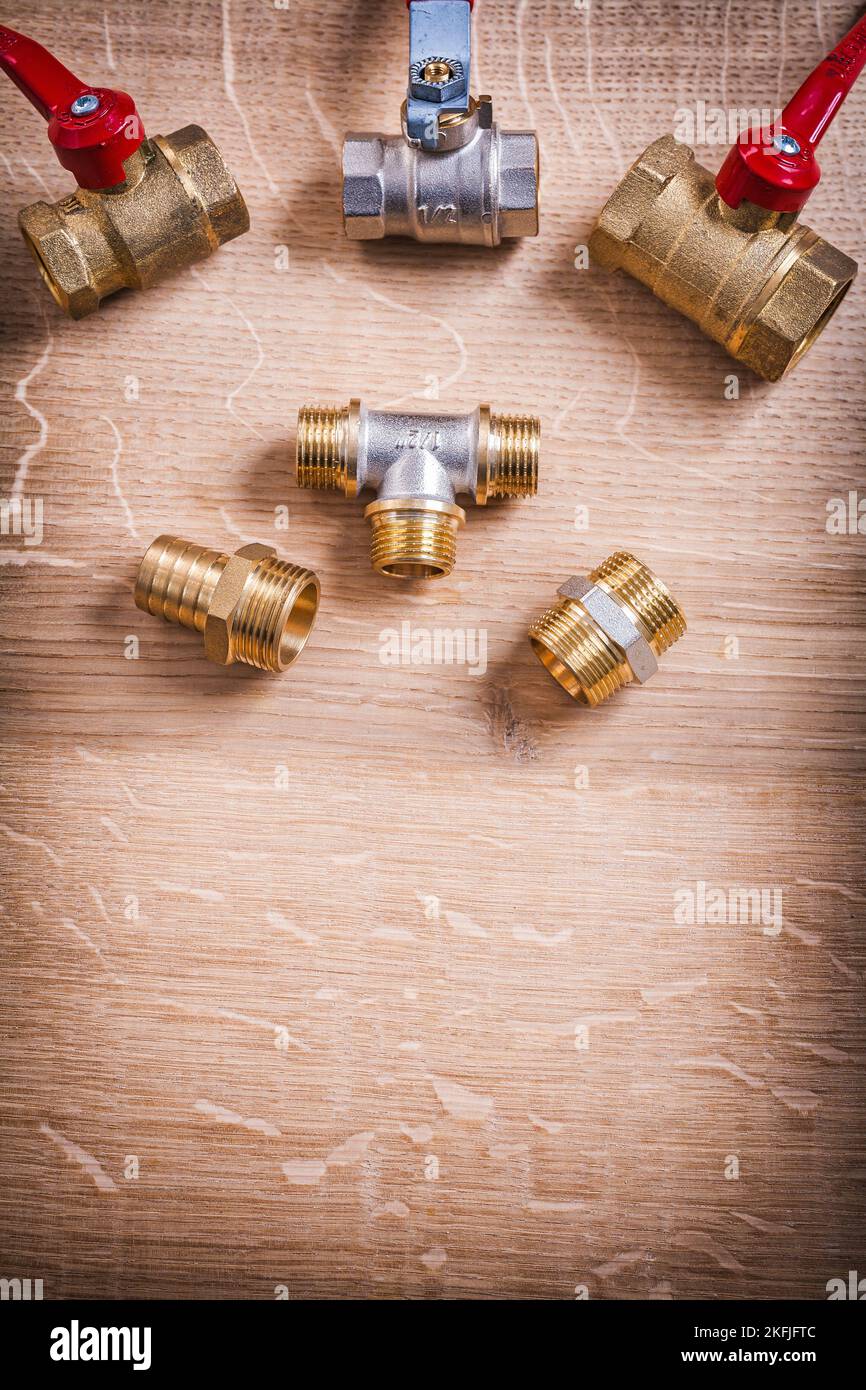 Plumbing Tools Brass Pipe Connectors On Wooden Board Stock Photo Alamy