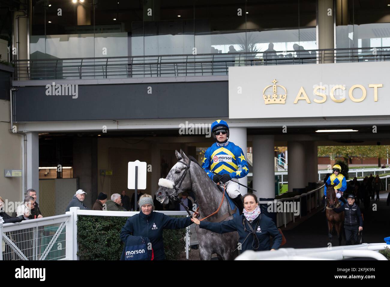 Ascot, Berkshire, UK. 18th November, 2022. Jockey Harry Cobden riding horse Kandoo Kid heads onto the racetrack before racing in the Troy Asset Management Introductory Hurdle Race at Ascot Racecourse. Kandoo Kid came third in the race. Credit: Maureen McLean/Alamy Live News Stock Photo