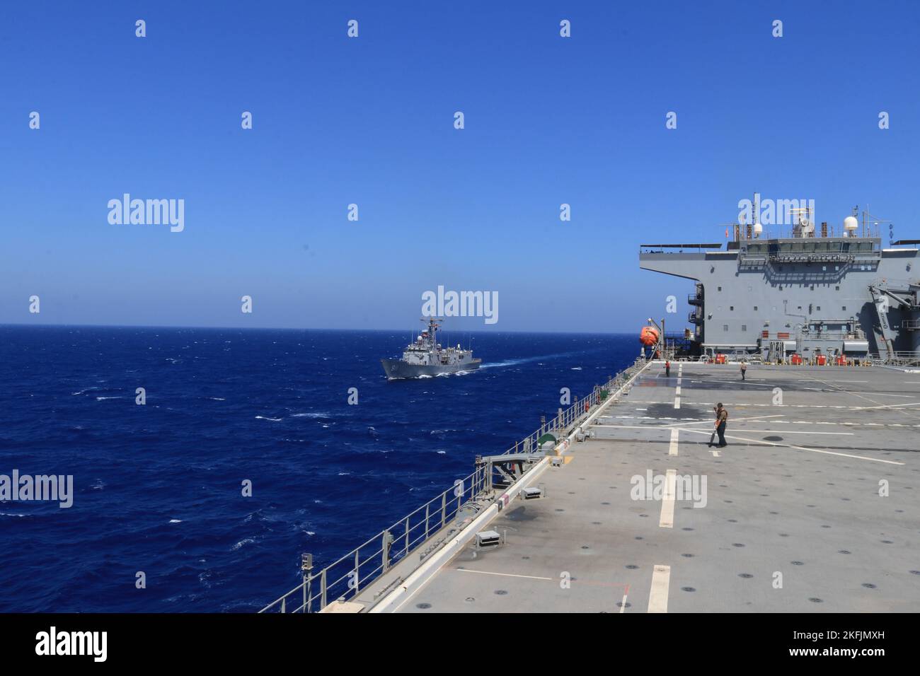 220920-N-NO146-1005 RED SEA (Sept. 20, 2022) Egyptian Navy frigate ENS  Alexandria (F911), left, and expeditionary sea base USS Lewis B. Puller  (ESB 3) sail alongside in the Red Sea Sept. 20. Lewis