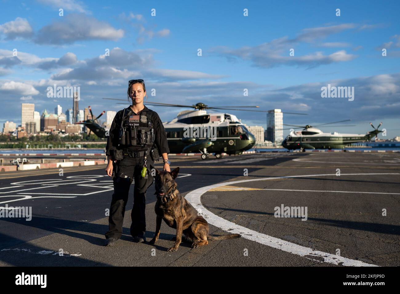 A U.S. Secret Service Uniform Division Officer and K9 Handler poses for a photo with her working