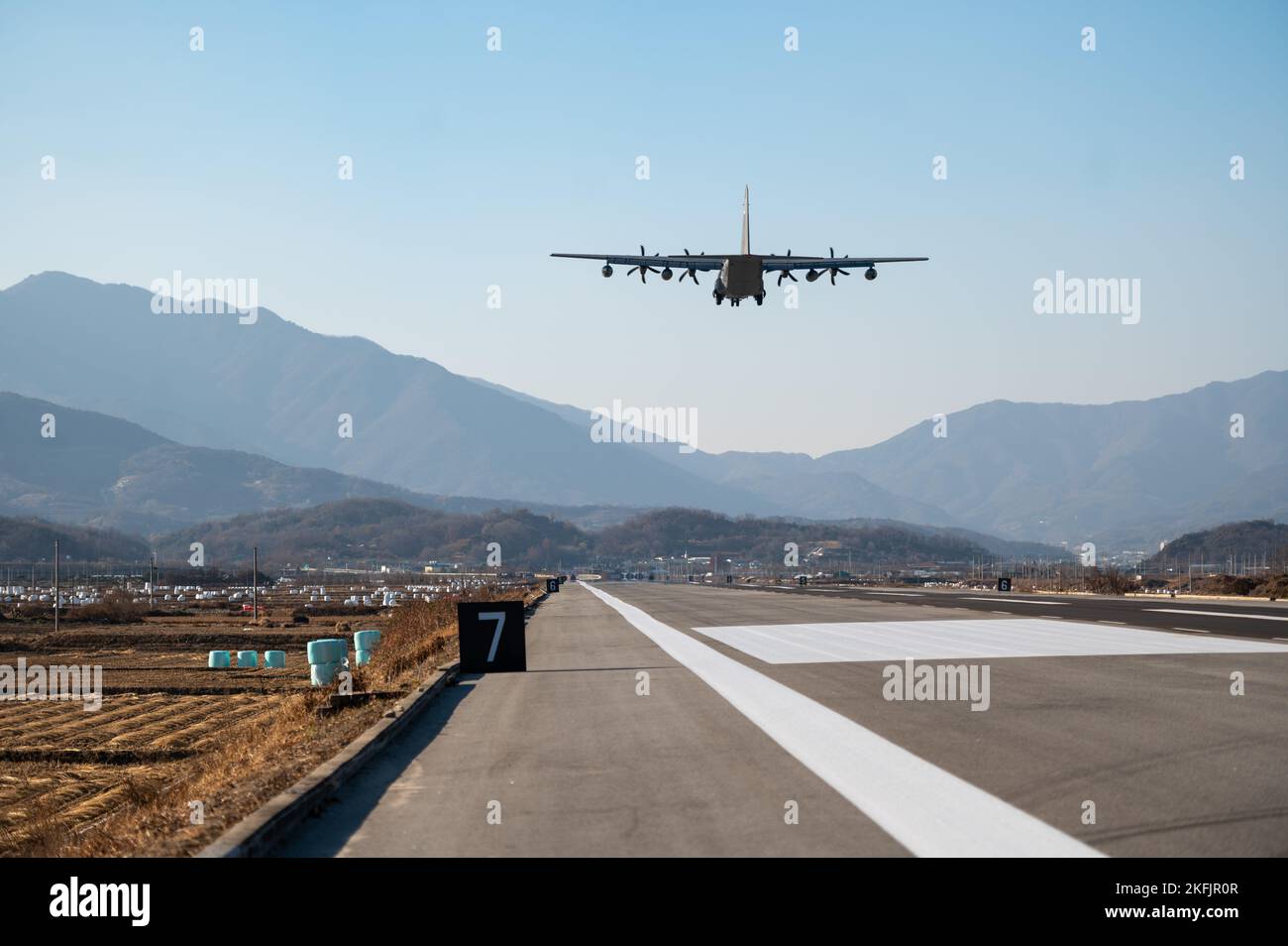 A U.S. Air Force MC-130J Commando II takes off after performing a low ...