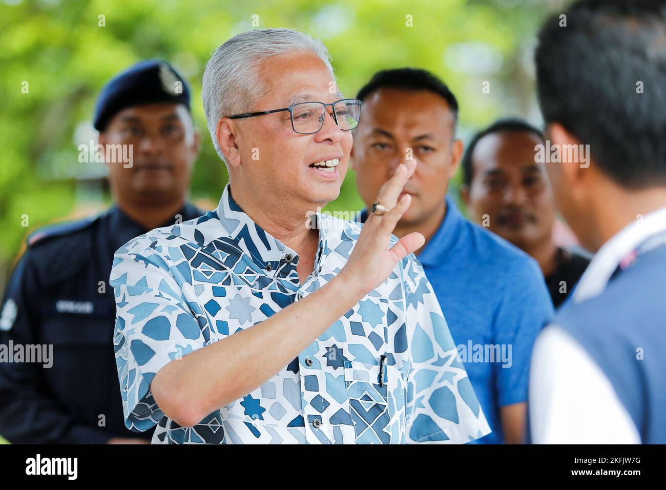 Malaysian Caretaker Prime Minister Ismail Sabri Yaakob waves as he arrives to vote during Malaysia's 15th general election in Bera, Pahang, Malaysia November 19, 2022. REUTERS/Lai Seng Sin Stock Photo