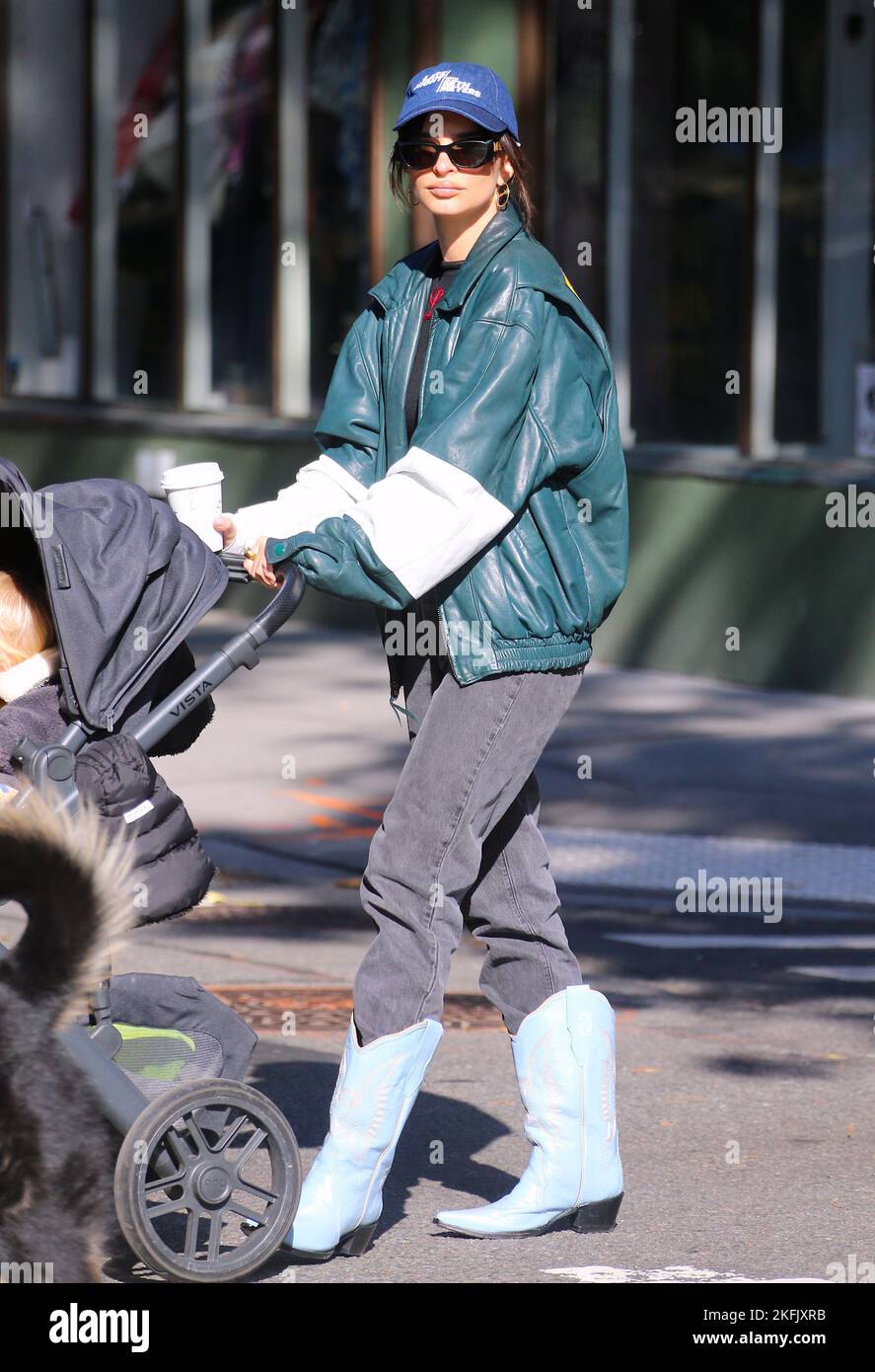 Emily Ratajkowski with her son Sylvester strolling in a cold weather
