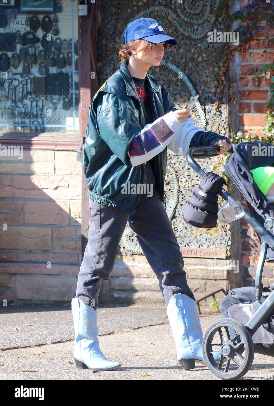 Emily Ratajkowski with her son Sylvester strolling in a cold weather