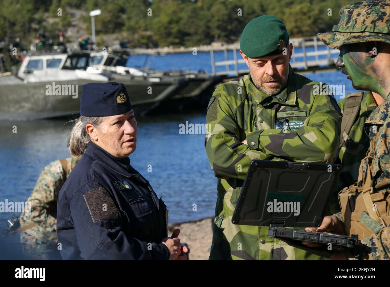 Swedish Navy Rear Admiral Ewa Skoog Haslum (left), Chief of Swedish Navy, and Col. Adam Camél (right), commanding officer, Stockholm Marine Regiment, receives a demonstration on expeditionary engineering reconnaissance equipment employment while visiting U.S. and Swedish Marines during exercise Archipelago Endeavor 22 (AE22) on Berga Naval Base, Sweden, Sept. 21, 2022. AE22 is an integrated field training exercise that increases operational capability and enhances strategic cooperation between the U.S. Marines and Swedish forces. Stock Photo
