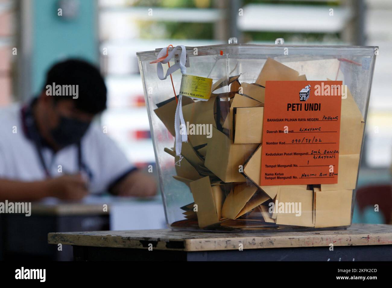 A ballot box sits on a table during Malaysia's 15th general election in Bera, Pahang, Malaysia November 19, 2022. REUTERS/Lai Seng Sin Stock Photo