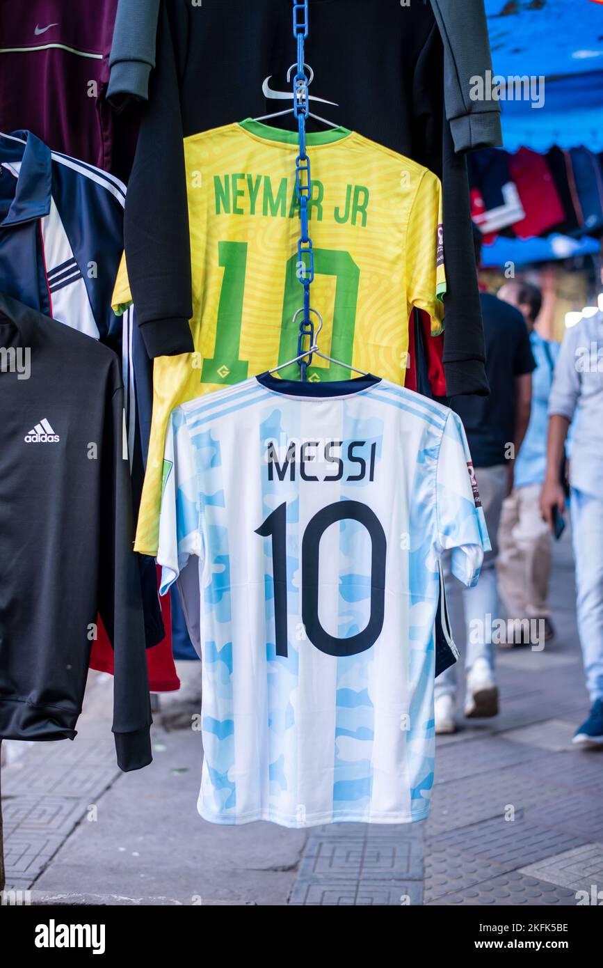 Calcutta, India - November 15, 2022. Soccer jerseys of Leonor Messi and Neymar are hanging in a retail shop to sell. Stock Photo