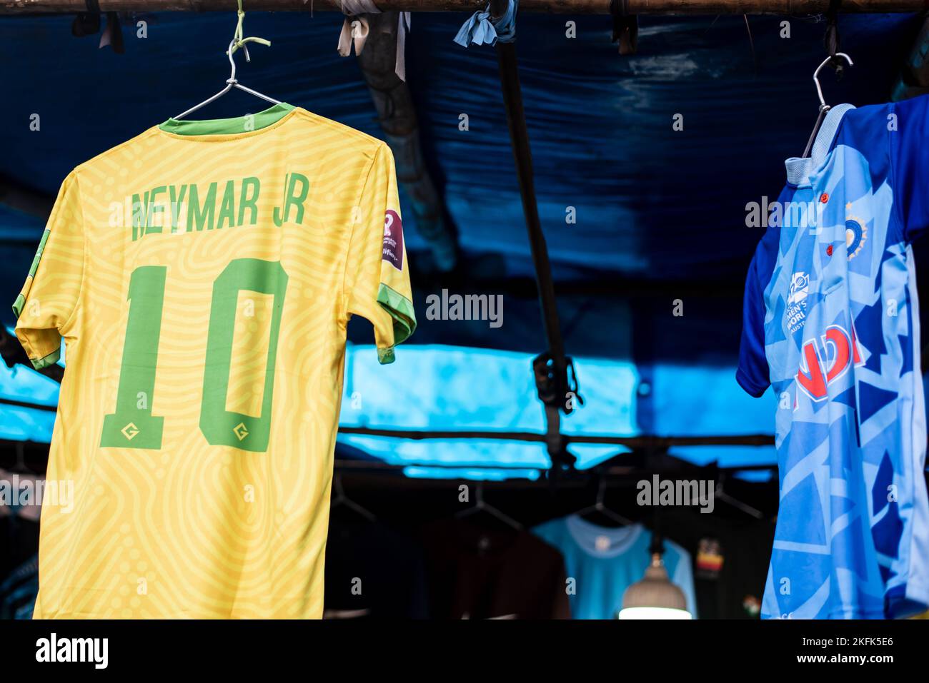 Calcutta, India - November 15, 2022. Soccer jerseys of Neymar is hanging in a retail shop to sell. Stock Photo