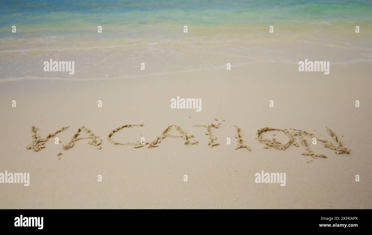 Thank You Written On Sand By Sea At Beach Stock Photo - Alamy