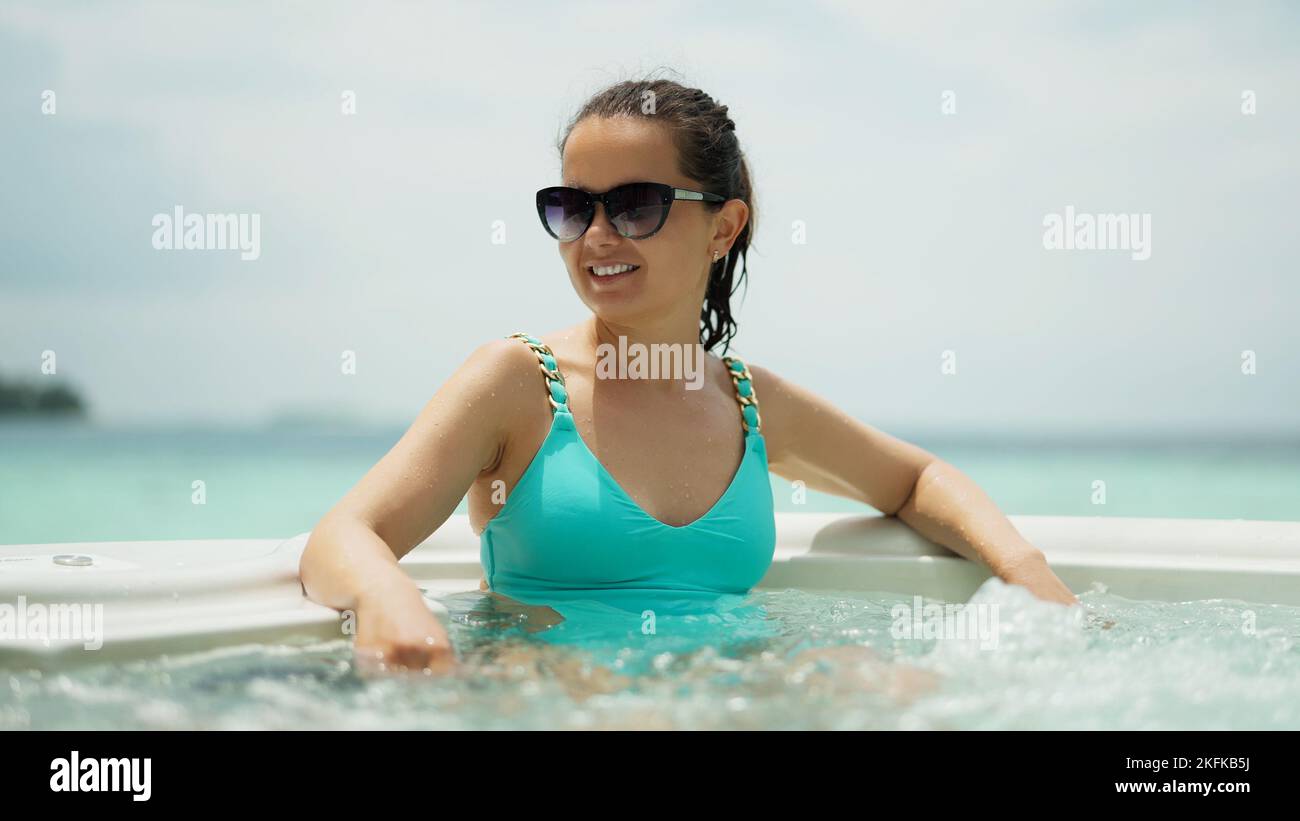 Woman Whirlpool Spa Wellness And Relaxation. Female Wellbeing Stock Photo