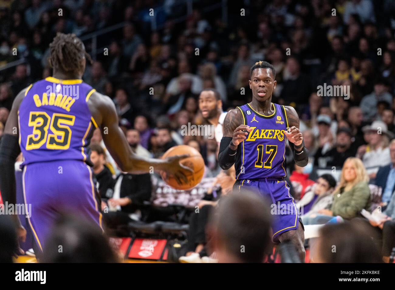 18 November 2022, US, Los Angeles: Basketball: NBA, Los Angeles Lakers -  Detroit Pistons; Main round, Main round games, Matchday 31: National  basketball player Dennis Schröder (right) receives a pass from Wenyen