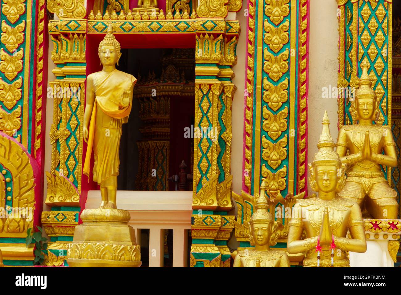 Thailand temple detail view with abstract colours and gold leaf texture. Stock Photo