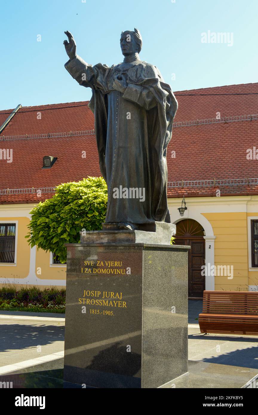 The monument of Bishop J.J. Strossmayer was made by the sculptor Marijan Sušec. It was installed in 1999 across the Cathedral of St Peter. Stock Photo