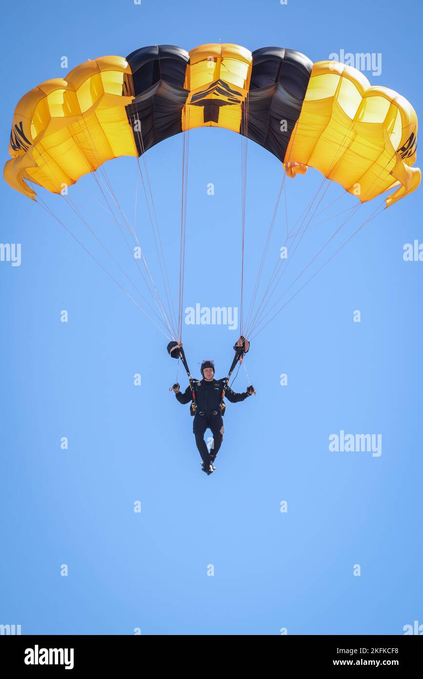 The U.S. Army Parachute Team conducts a demonstration at the 2022 Marine Corps Air Station Miramar Air Show at MCAS Miramar, California, Sept. 23, 2022. Nicknamed the Golden Knights in 1962, “Golden” signifies the gold medals the team won in international competitions, and “Knights” alludes to the team’s ambition to conquer the skies. The Golden Knights perform in more than 100 events per year.  The theme for the 2022 MCAS Miramar Air Show, “Marines Fight, Evolve and Win,” reflects the Marine Corps’ ongoing modernization efforts to prepare for future conflicts. Stock Photo