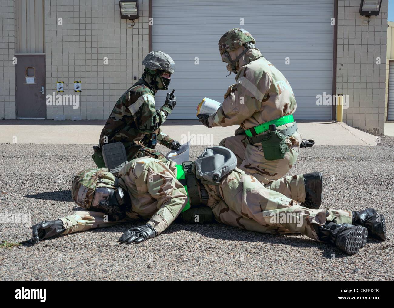 U.S. Air Force Airmen assigned to the 140th Wing conduct a post attack ...