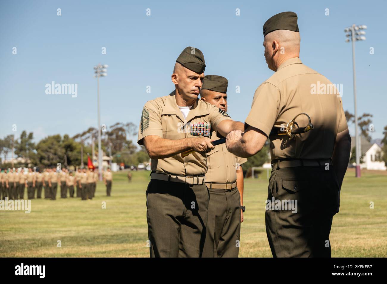 U.S. Marine Corps Sgt. Maj. Eric Darmstadt, left, the outgoing sergeant